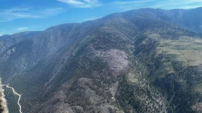 Aerial photo showing smoke skies around the Izman Creek wildfire
