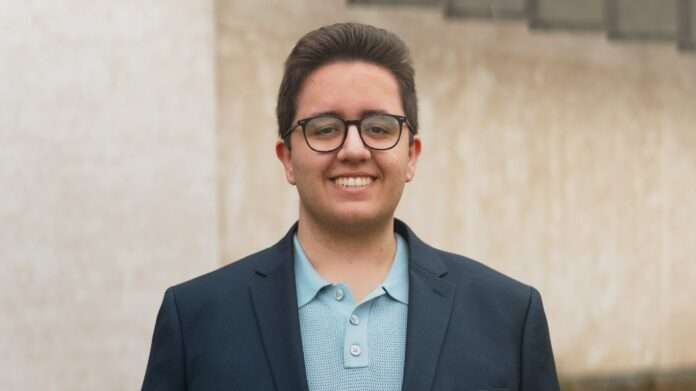 Headshot photo of Adam Bremner-Akins