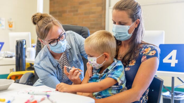 Photo of a child receiving a vaccination