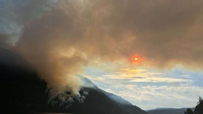 Photo of smokey skies near Wesley Ridge wildfire