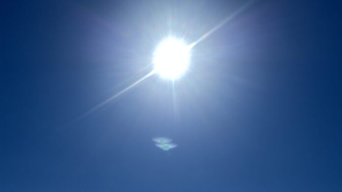 Photo of the sun in a cloudless sky