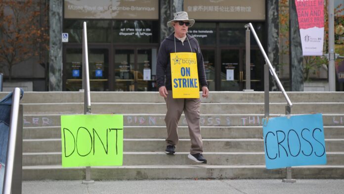 Striking BCGEU worker at Royal B.C. Museum