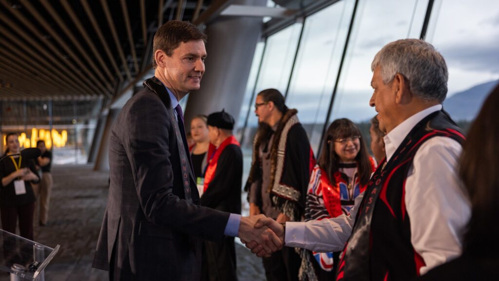 Premier David Eby shakes hand with Coastal First Nations leaders