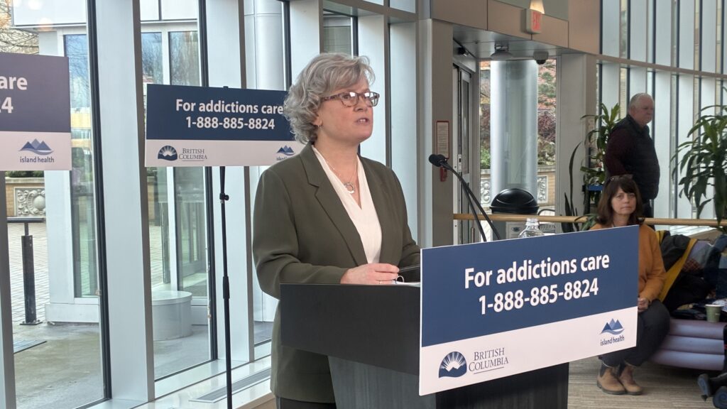 Health Minister Josie Osborne speaks at a Victoria hospital