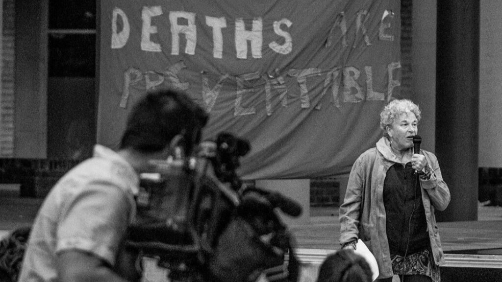 Leslie Mcbain speaking at an event