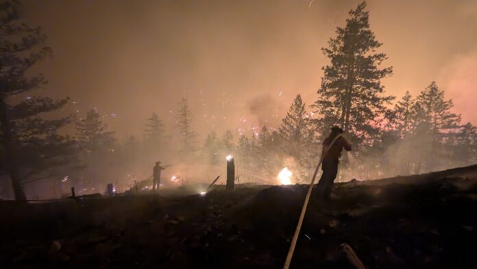 Overnight suppression work for Bald Range wildfire. Aug 07, 2026 | BCWS photo