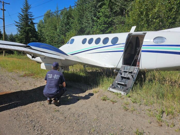 TSB Investigators on the scene of Thursday's plane crash in PG on Foothills Boulevard. Submitted by Transportation Safety Board of Canada.